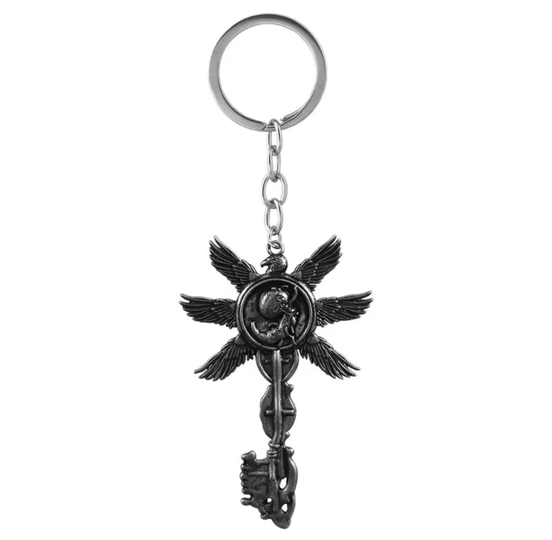 Llavero Resident Evil Village VIII – Llave de las Seis Alas Metálica para Colección by GamerSpot